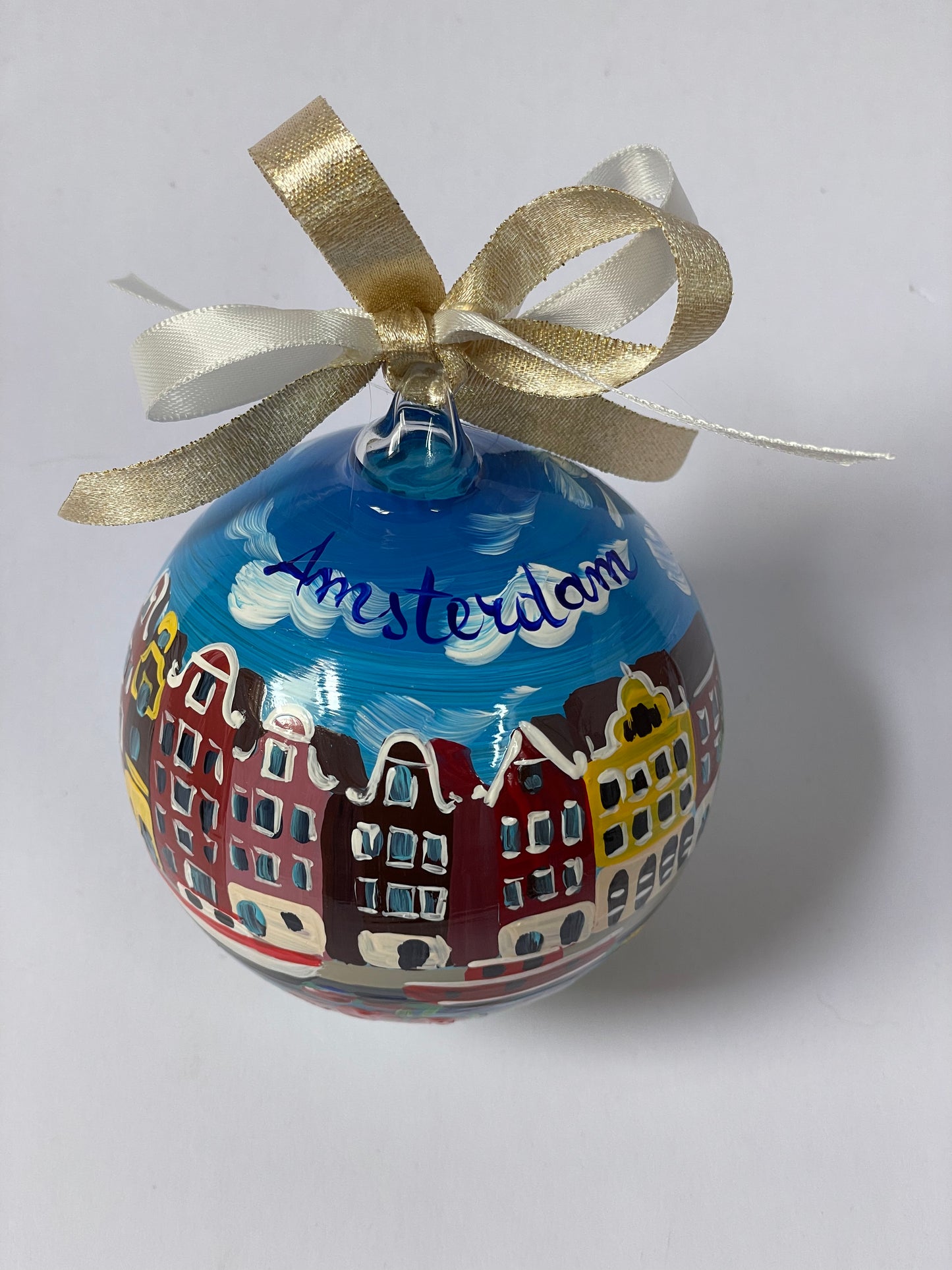 Hand-painted glass ornament flat lay – Amsterdam canal with colourful gabled houses, red boats and tulips, Netherlands souvenir