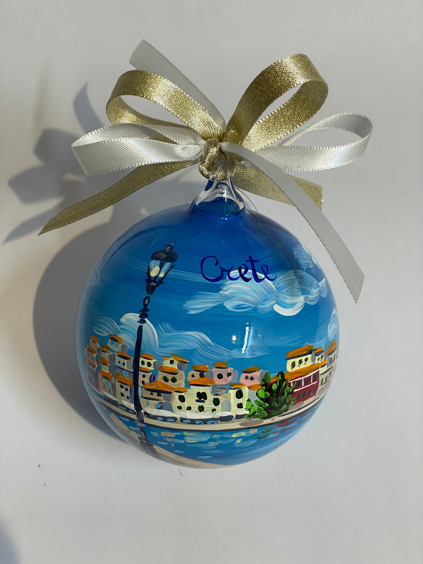 Crete hand-painted glass ornament front view – Chania harbour, street lamp and blue Mediterranean sky