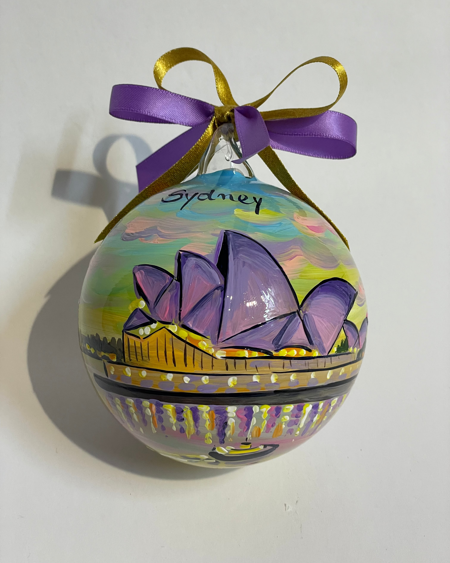 Hand-painted glass ornament – Sydney Opera House at sunset with purple and gold tones, Australia souvenir